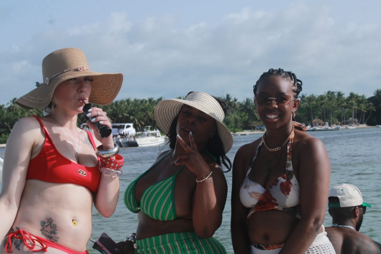 Friends enjoying time together aboard a coastal boat cruise